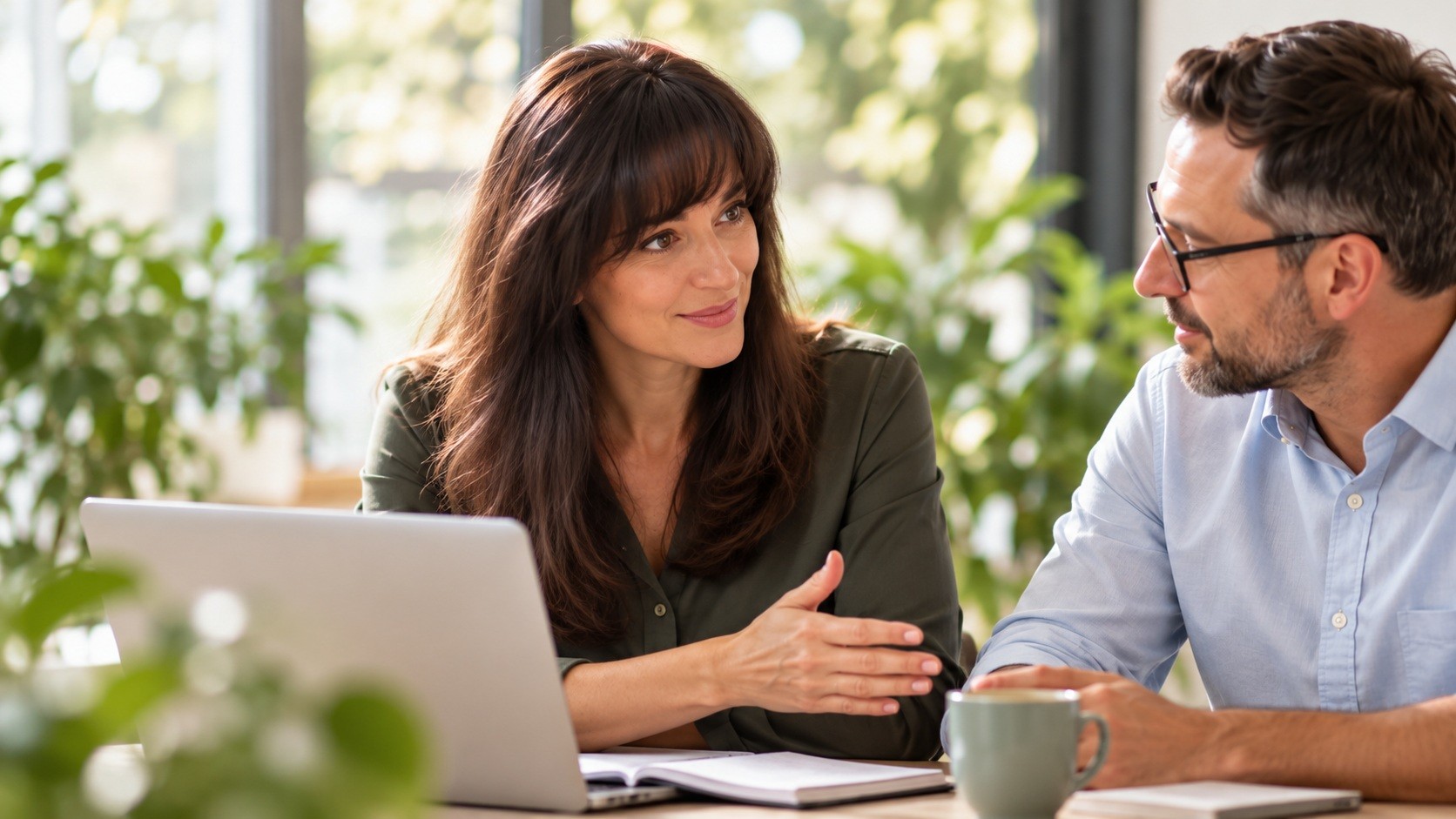 Business consultation at a laptop
